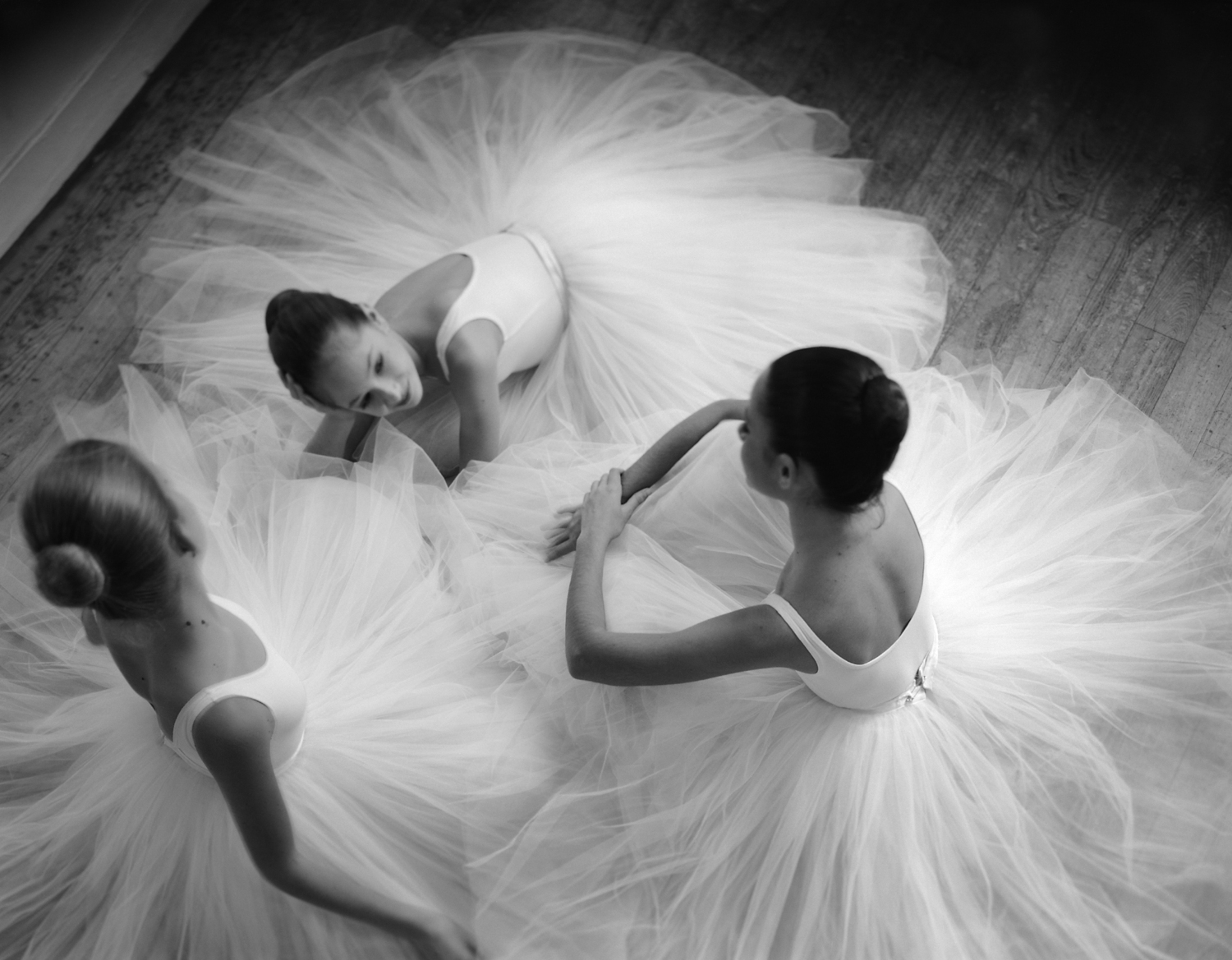 Three dancers resting